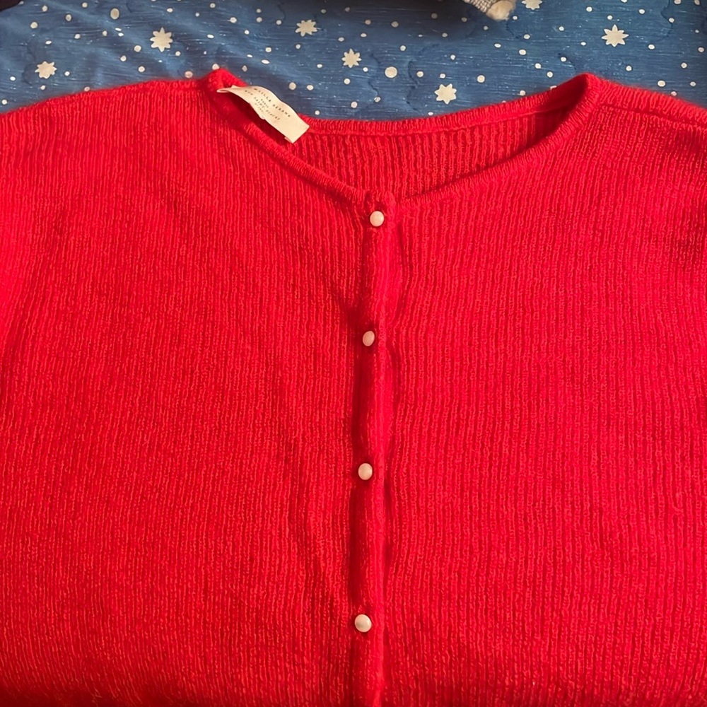 Gently worn XS Sézane Gasper’s cardigan on red
